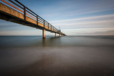 View of bridge over sea against sky