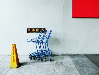 Shopping carts against wall