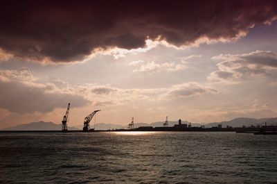 Scenic view of sea against cloudy sky