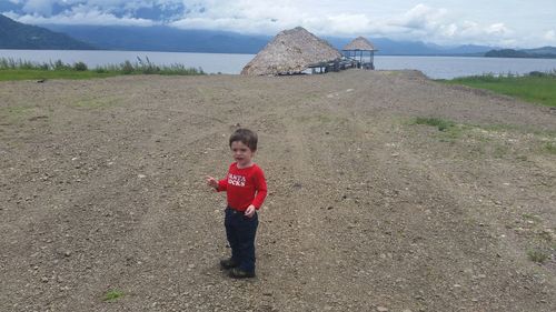 Full length of boy on beach