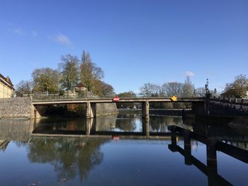 Bridge over river against sky