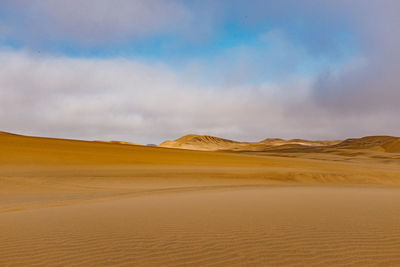 Scenic view of desert against sky