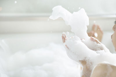 Woman having bubble bath