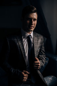 Young man looking at camera