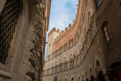 Low angle view of historic building against sky