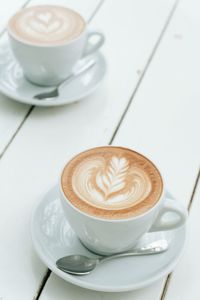 High angle view of cappuccino on table