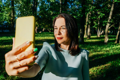 Young woman using mobile phone