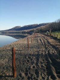 Scenic view of beach against clear sky