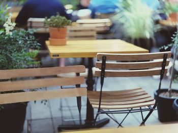 Empty chairs and table in restaurant