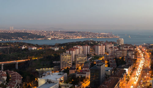 High angle view of illuminated cityscape at night