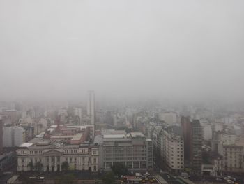 High angle view of buildings in city during winter