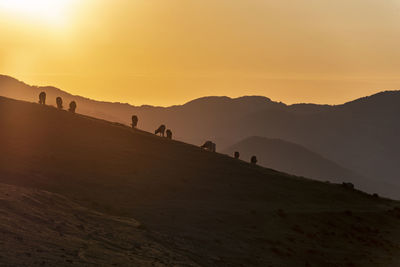 Scenic view of mountains during sunset