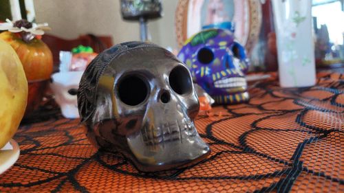 Close-up of human skull on table