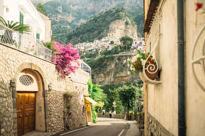 Road amidst buildings at positano