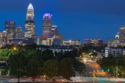 Illuminated buildings in city at night, downtown charlotte north carolina