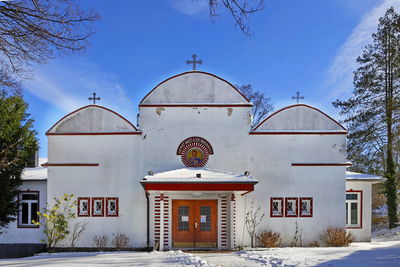 Exterior of building against sky during winter