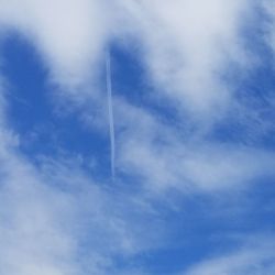 Low angle view of vapor trail in sky