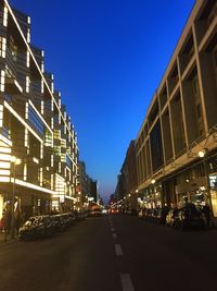 Road along buildings in city