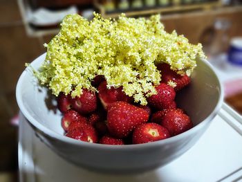 Close-up of strawberries in bowl on table