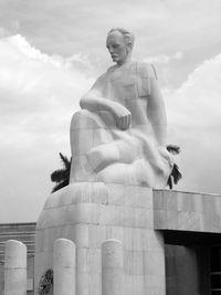 Low angle view of statue against sky