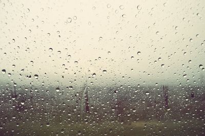 Full frame shot of raindrops on window