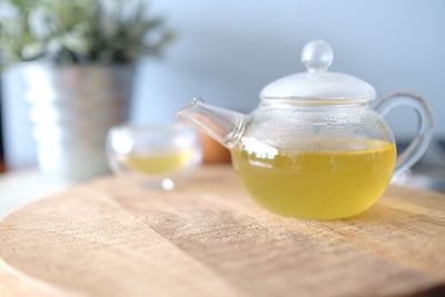 Close-up of tea pot on table at home