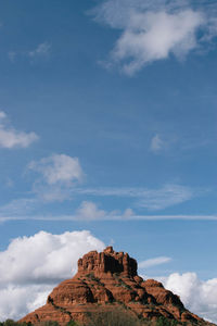 Low angle view of rock against sky
