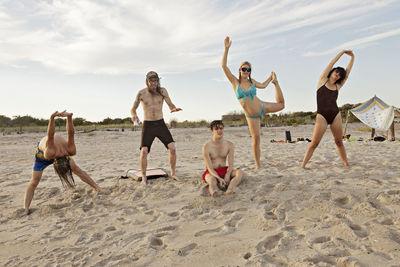 Friends hanging out on a beach