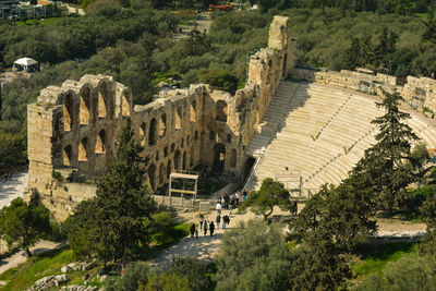 The ancient stone roman theater odeon of herodes atticus located beneath th acropolis of athens