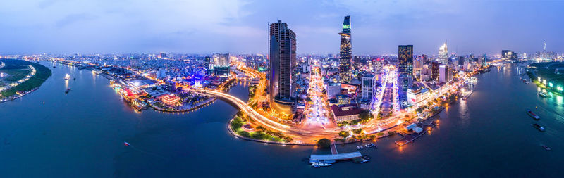 Aerial view of illuminated city at night