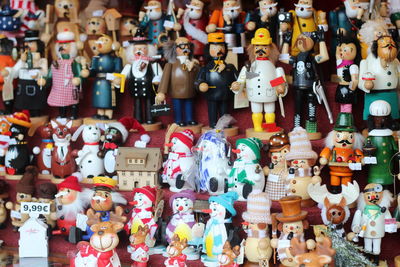 Close-up of toys at market stall for sale