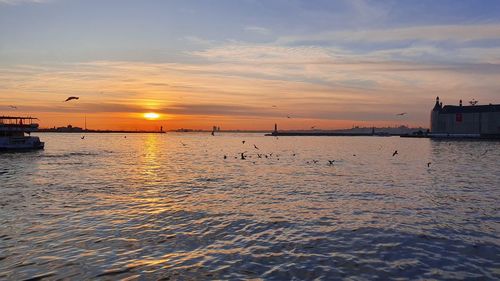 Scenic view of sea against sky during sunset