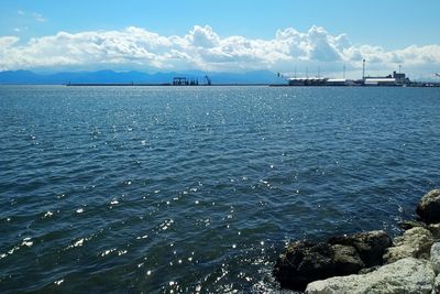Scenic view of sea against blue sky