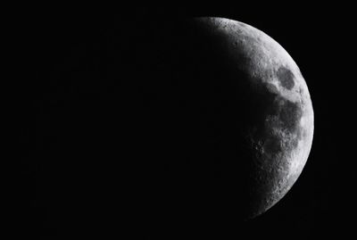 Low angle view of moon against sky at night