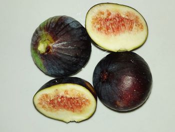 High angle view of fruits on white table