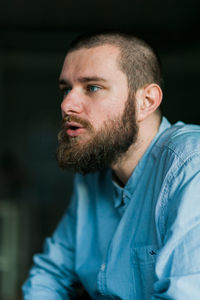 Close-up of smiling man looking away