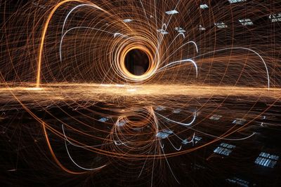 Illuminated wire wool inside abandoned building