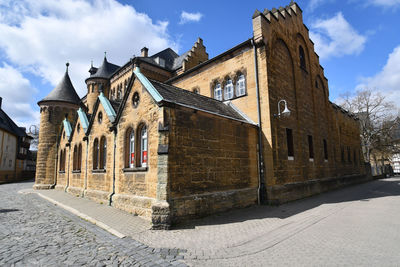 View of historic stone building in the old town district of goslar. 