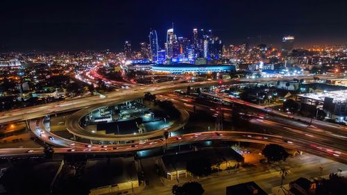 High angle view of illuminated city at night,los angeles drone view of downtown skyline