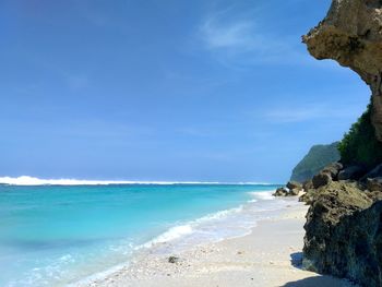 Scenic view of sea against blue sky