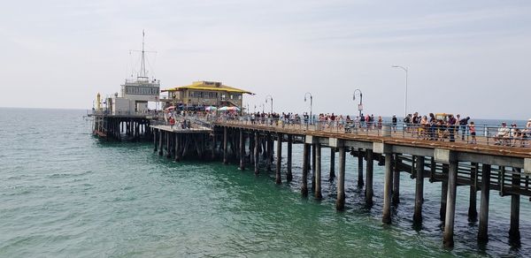 Pier on sea against sky