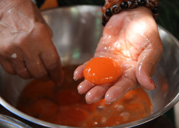 Close-up of person preparing food