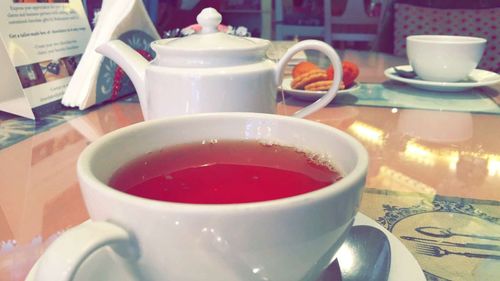 Close-up of coffee cup on table