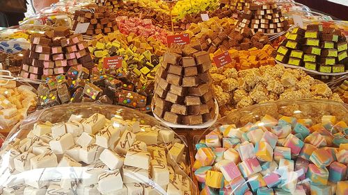 Close-up of multi colored candies for sale in market