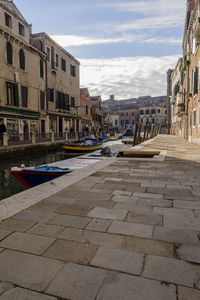 View of buildings in city against sky
