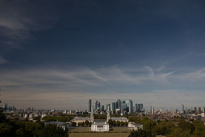 Panoramic view of buildings against sky in city