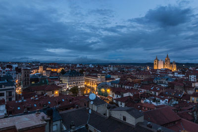 High angle view of illuminated buildings in city