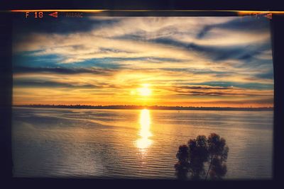 Scenic view of sunset over sea