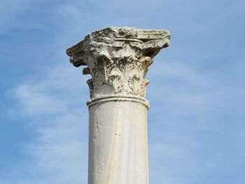 Low angle view of statue against sky