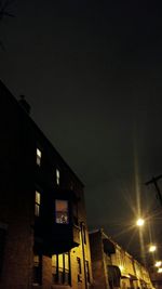 Low angle view of building against sky at night